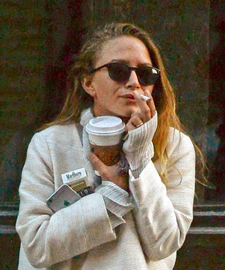 Instagram post by @nenthe for The Row. Caption reads: PUMPKIN SPICE SEASON.