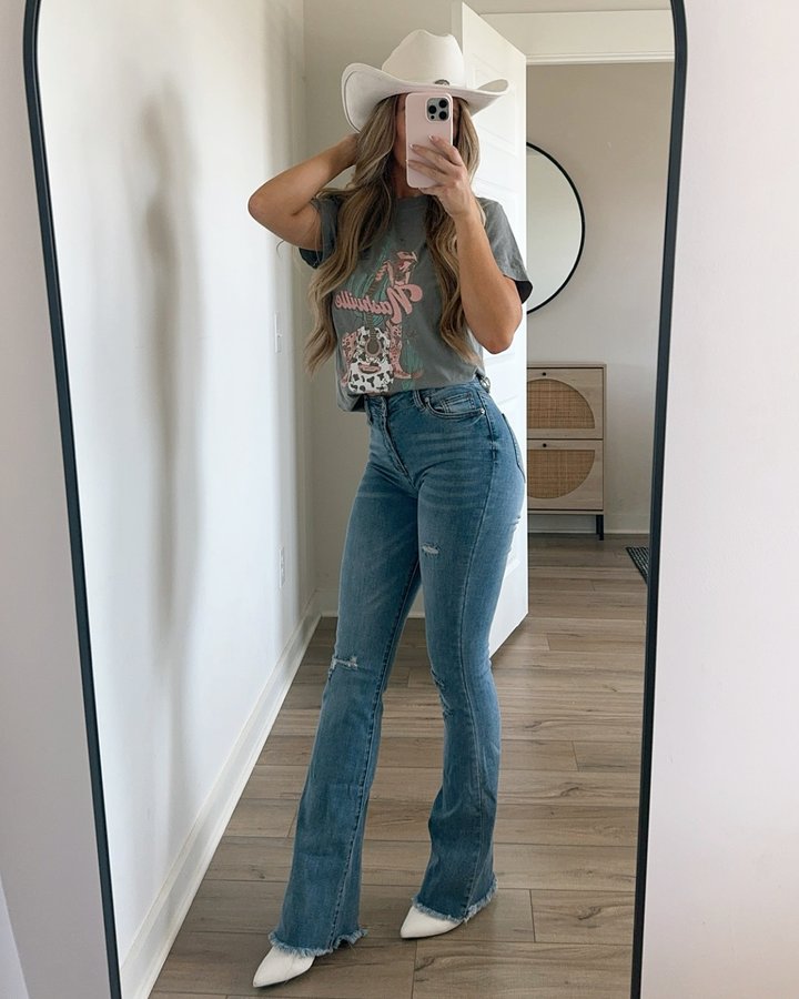 Instagram post by @erica_mmiller for Willow Boutique. Caption reads: Blue jeans & cutie tees from @willowchicboutique....