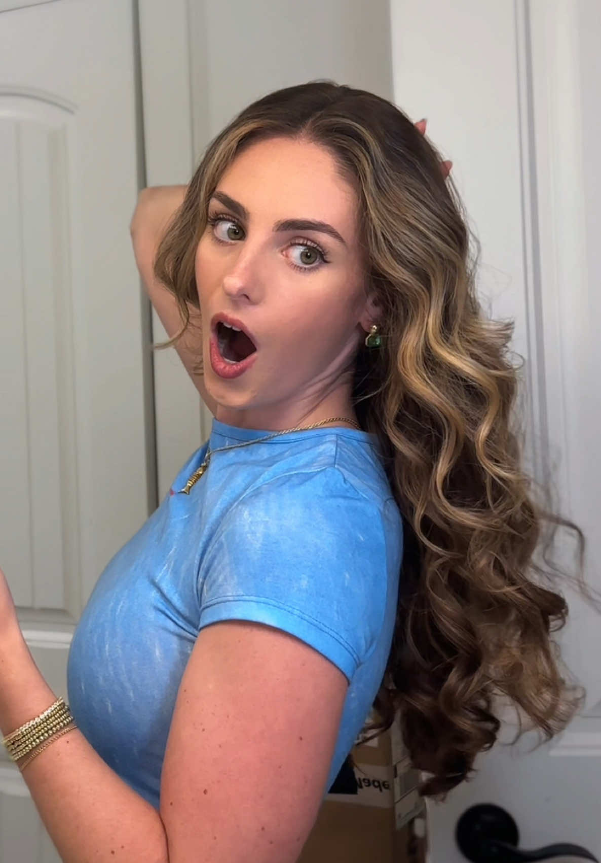 TikTok post by @haimabby for TYMO Beauty. Caption reads: New favorite way to curl my hair with @TYMO BEAUTY....