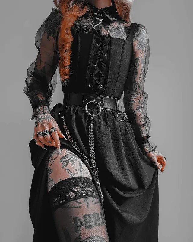 Instagram post by @kllsym for DISTURBIA. Caption reads: Another @disturbia outfit dump. This time midi....