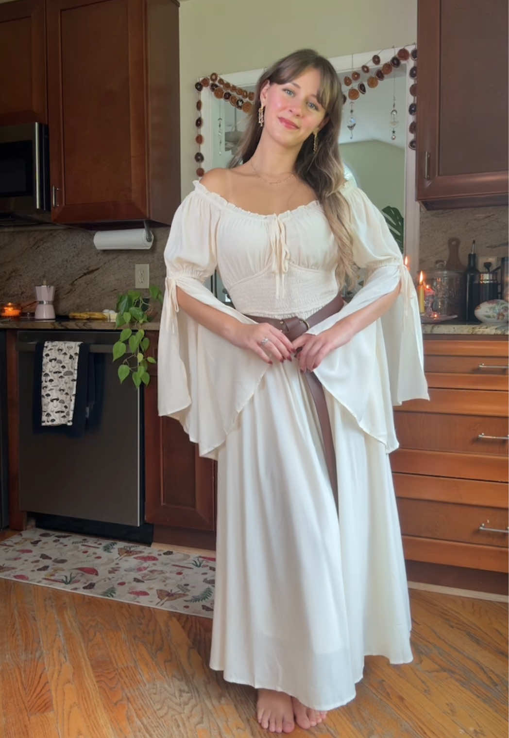 TikTok post by @danisalvadore_ for Scarlet Darkness. Caption reads: [...]            Dress and belt is from @Scarlet....