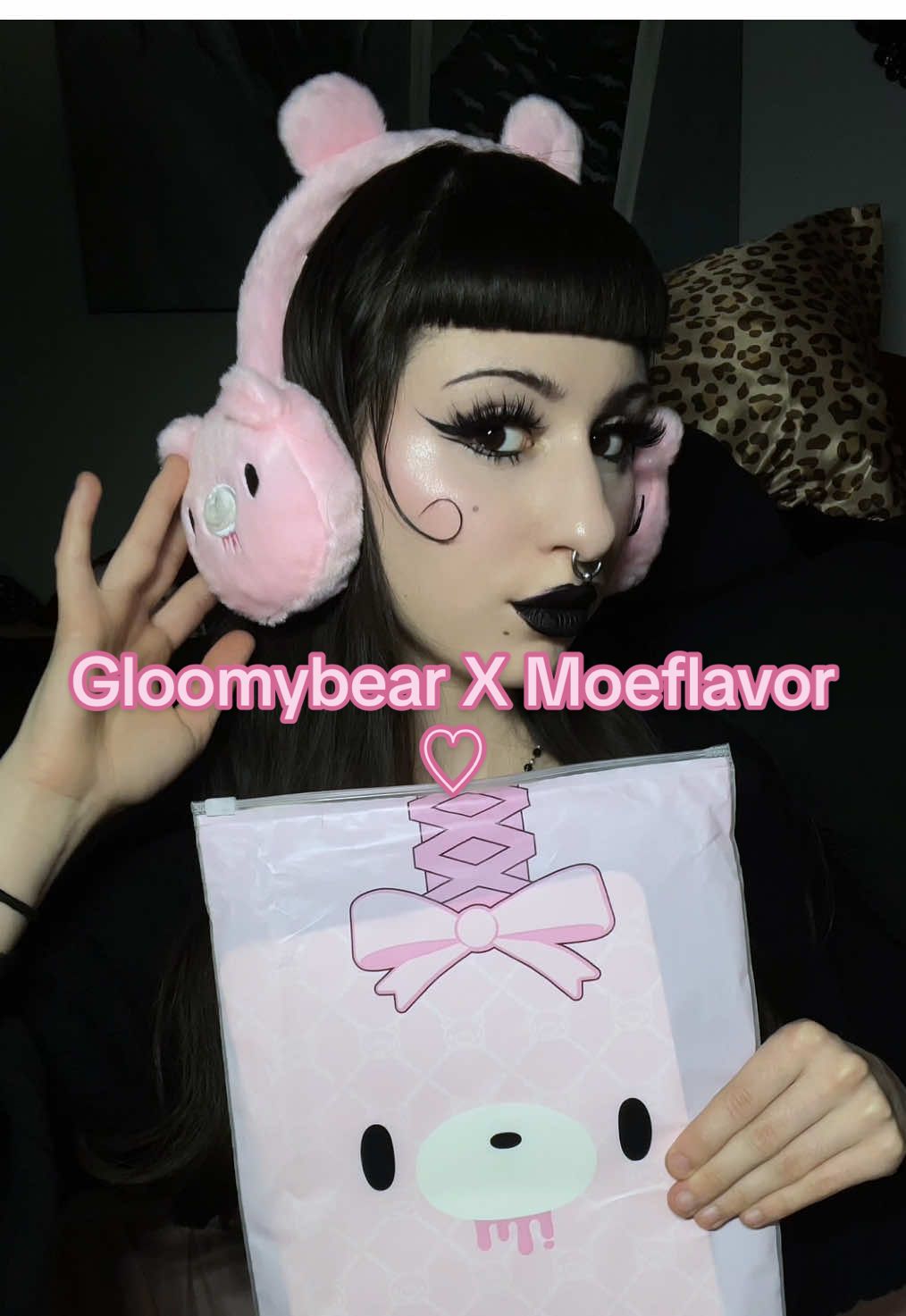 TikTok post by @petvampr for MoeFlavor. Caption reads: Gloomybear X Moeflavor earmuffs ♡🐻🎀 @MOEFLAVOR....