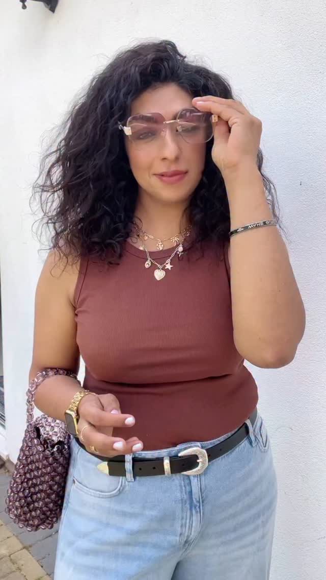 Instagram post by @style.by.sheryl for Coconut Lane. Caption reads: Own your style this summer with standout pieces....