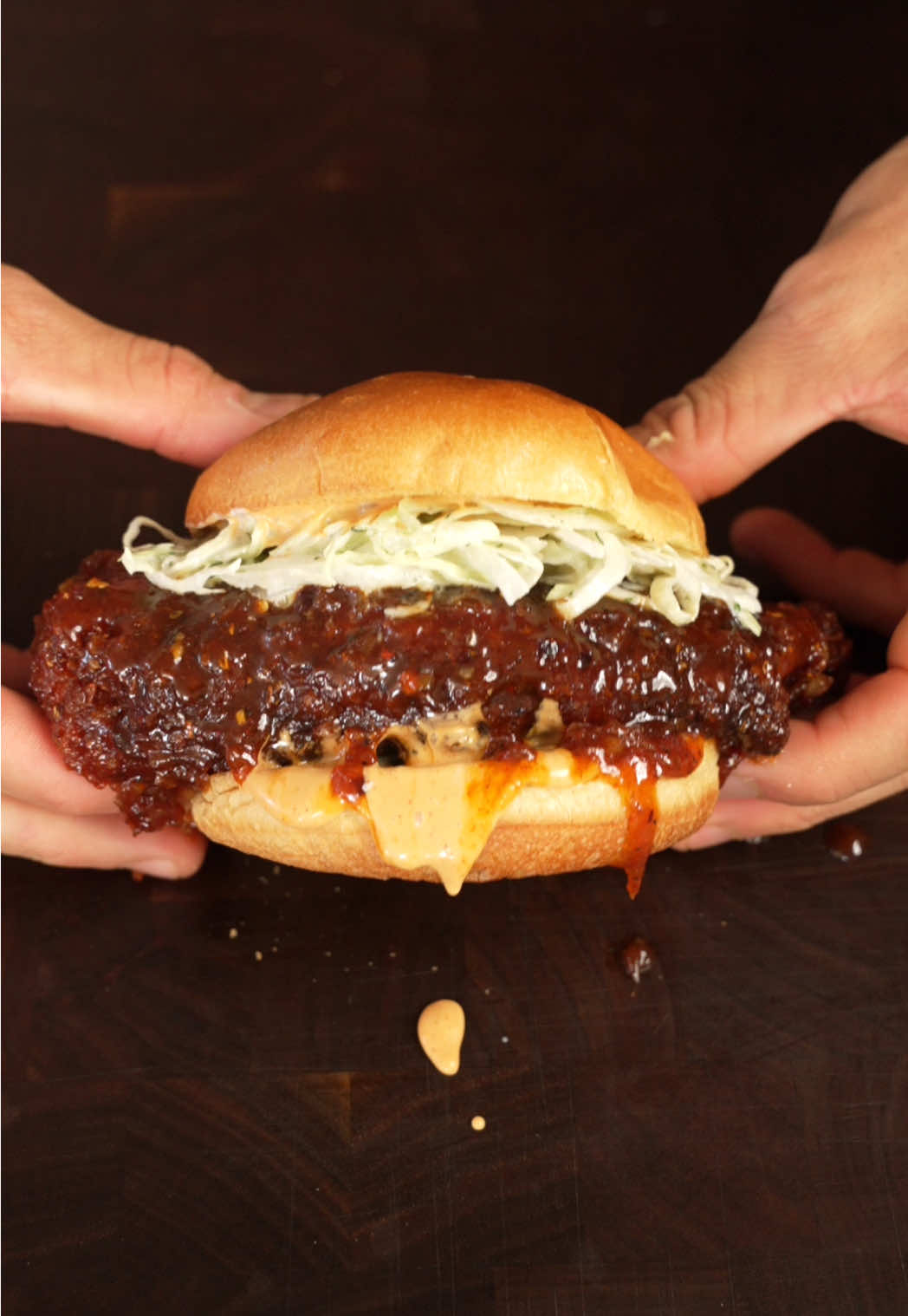 TikTok post by @owen.han for SAXX Underwear. Caption reads: [...] & spicy cajun chicken sandwich 🤝 @SAXX....