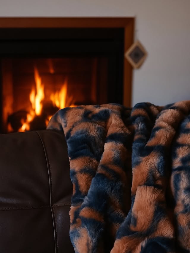 Instagram post by @alyonkashe for Nine West. Caption reads: [...] this ultra-soft faux fur blanket from....