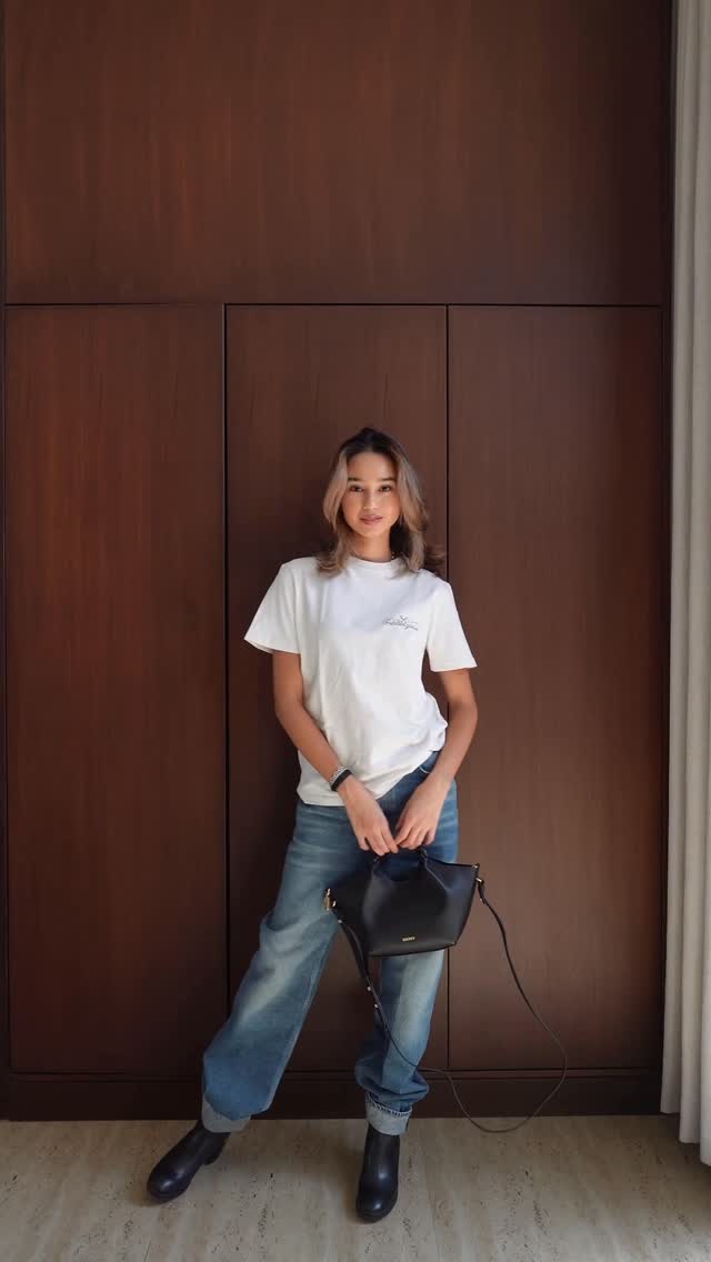 Instagram post by @ruba.tursun for DKNY. Caption reads: Always styled with @dkny 
@haileybieber @dkny.me....