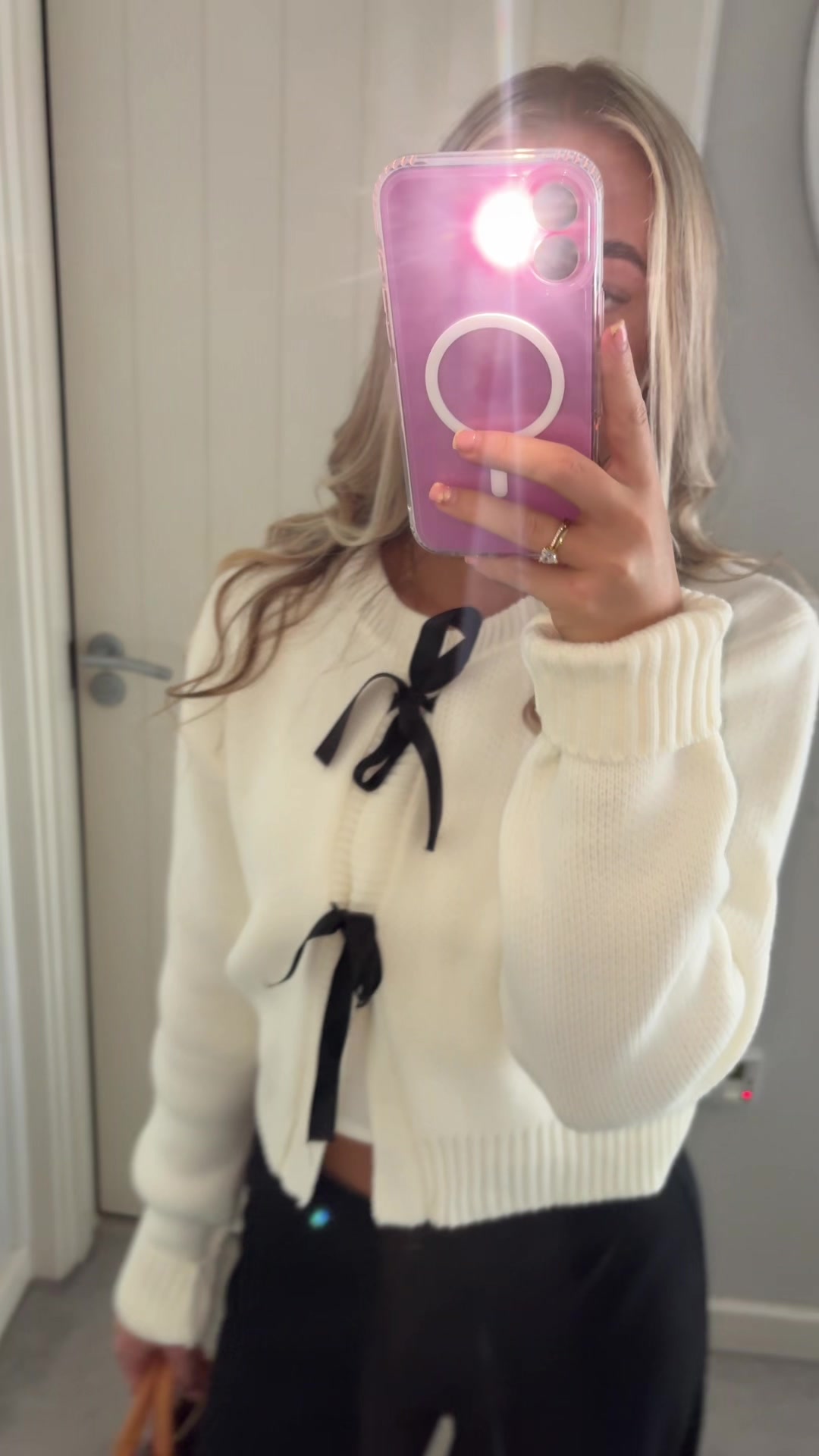 TikTok post by @hollyad123 for Rebellious Fashion. Caption reads: @Rebellious Fashion cute cardi 🤍🖤#fyp [...].