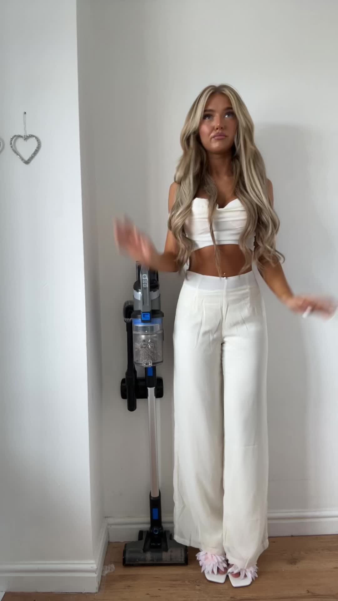 TikTok post by @neivehall for Simmi London. Caption reads: @SIMMILONDON 🤍🌺.