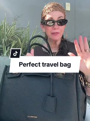 TikTok post by @aestheticaleestyles for Newbella Fashion. Caption reads: @Newbella.Fashion my gorgeous travel bag I used....