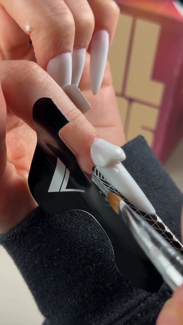 Instagram post by @miralina_nails for VBeautyPure. Caption reads: #ASMR “true white” acrygel set in 23 seconds 🫦🤍....