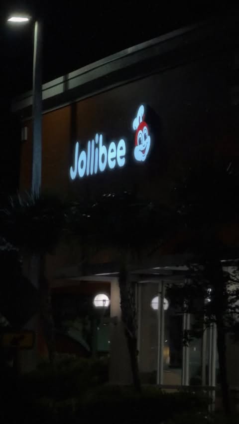 Instagram post by @emzzfrisch for Jollibee US. Caption reads: #ad Tree is up, baby’s asleep, and @jollibeeus....