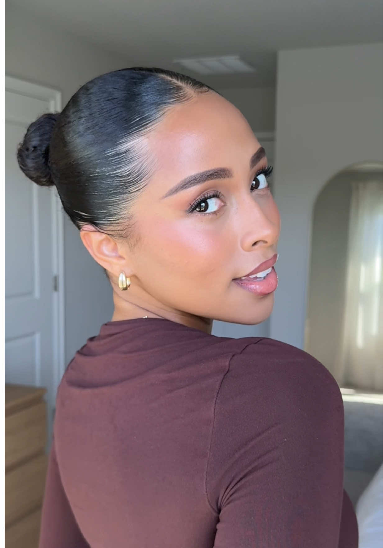 TikTok post by @kristina.manners for Biolage. Caption reads: [...] 🤎Products used: • Hair growth serum •....