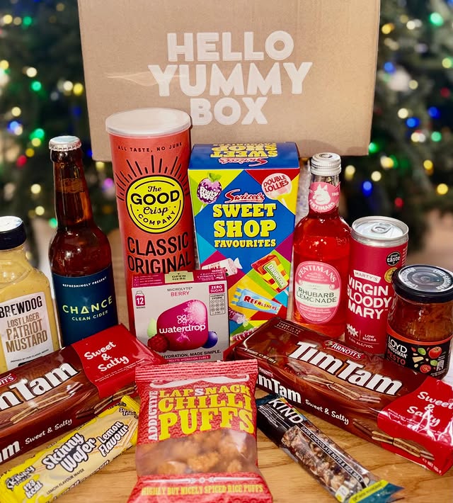 Instagram post by @lusciouslsfoodiefun for Hello Yummy Box. Caption reads: December Hello Yummy Box has arrived and it’s....
