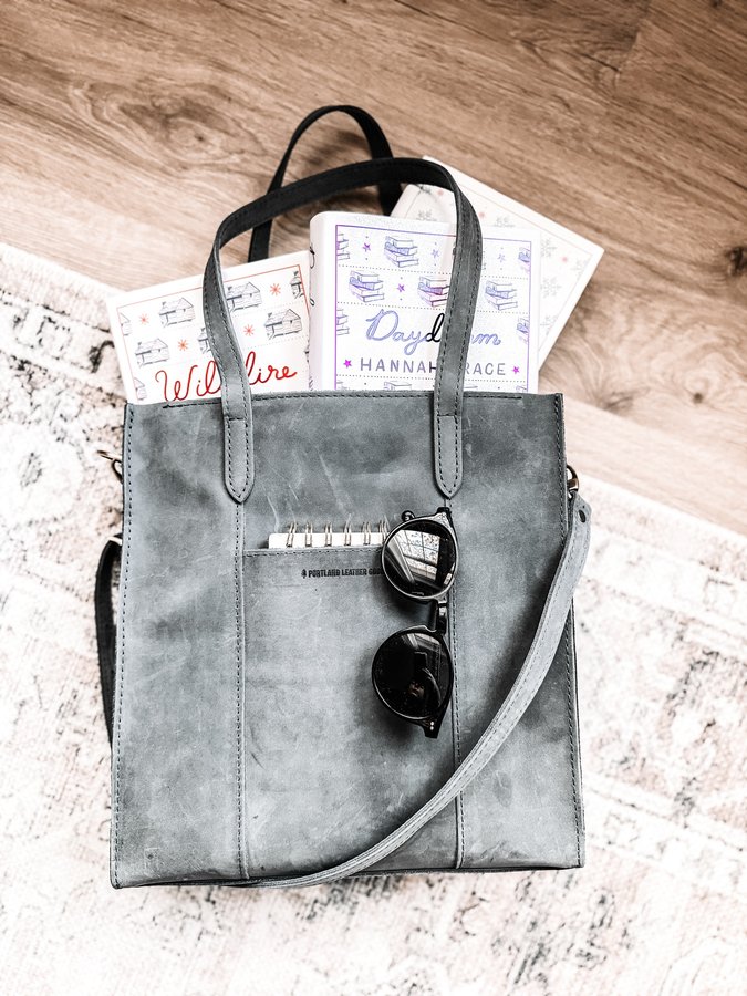 Instagram post by @marensreads for Portland Leather Goods. Caption reads: What to carry Wednesday? Is this a thing?? 

If....