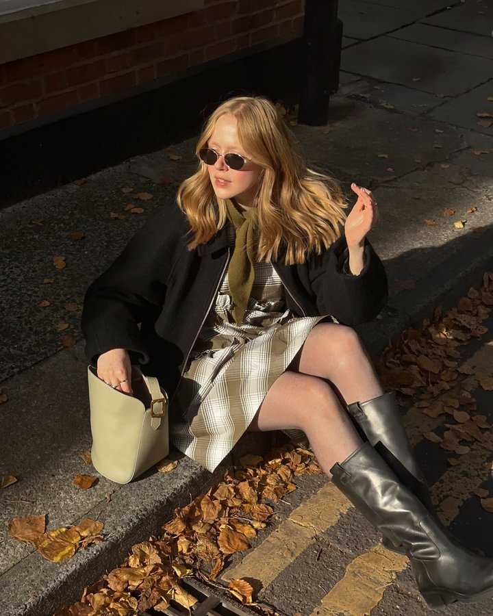 Instagram post by @hollyrebeccawhite for RISE & FALL. Caption reads: nothing says autumn like crunchy leaves and chunky....