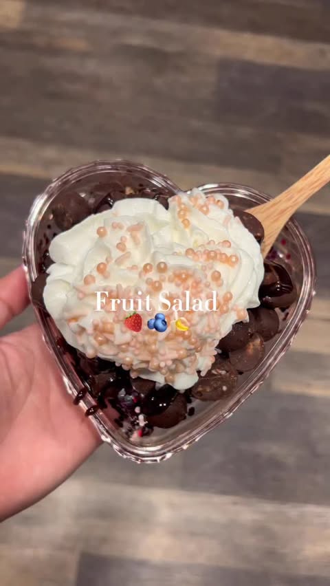 Instagram post by @b.ritt_lynn for Tru Fru. Caption reads: 🍓🍌🫐 Fruit salad for one? My favorite way to end....