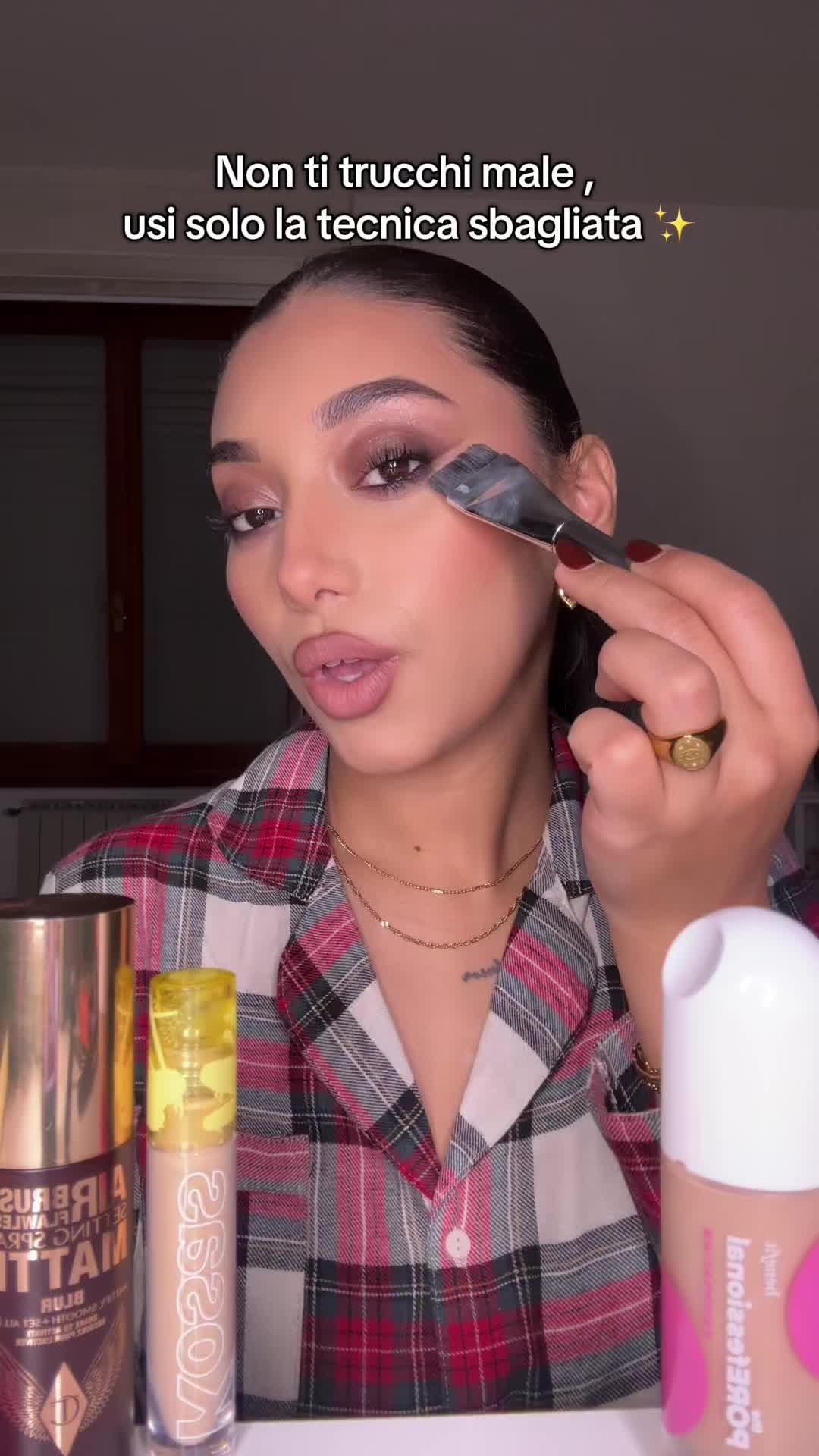 TikTok post by @ri.r.ia for Astra Make-Up. Caption reads: Trucco per il tuo natale svelato🎄🧊❄️ #makeup....