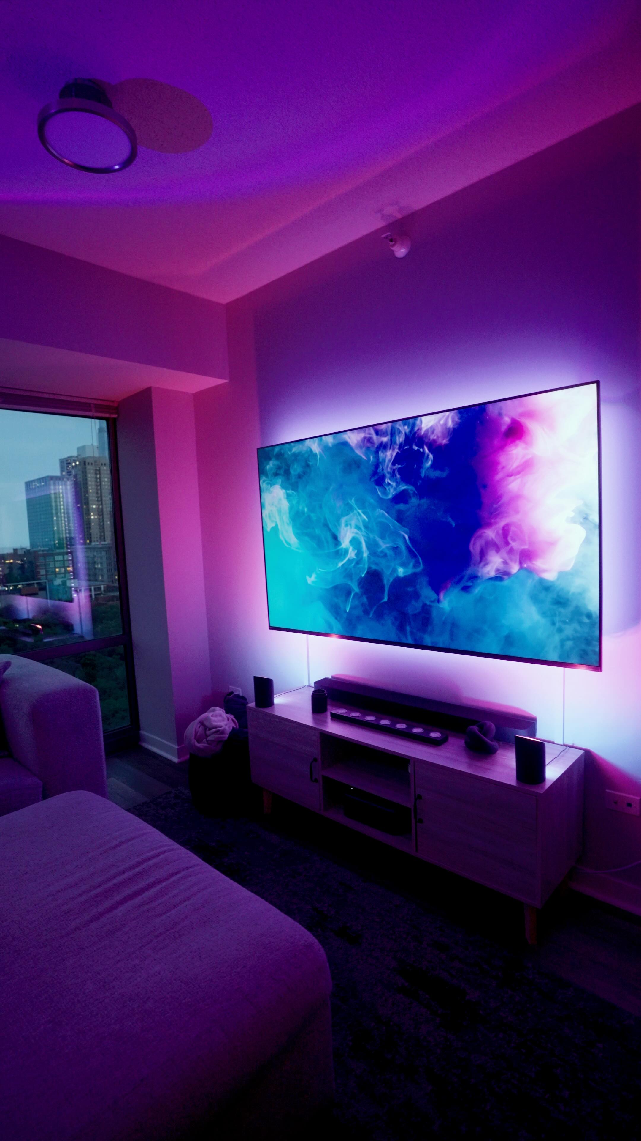Instagram post by @johnnyhochstetler for Philips Hue. Caption reads: #ad Been dialing in the vibe at home lately, and....