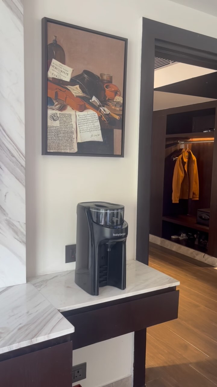 Instagram post by @oldsuitcasee for Baby Brezza. Caption reads: Honestly, the Baby Brezza WiFi Formula Pro from....