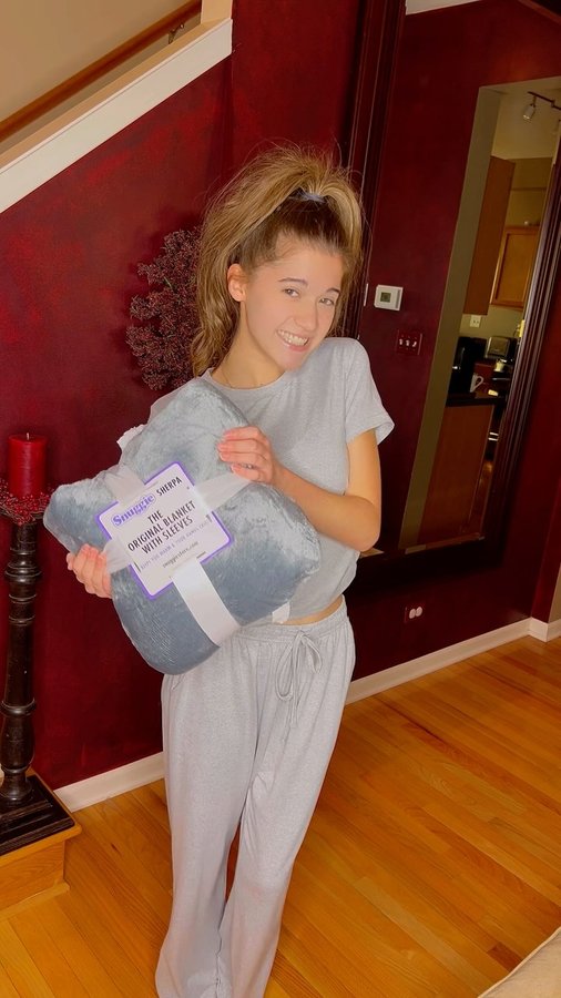 Instagram post by @nixon_snow_model_actress for Snuggie. Caption reads: [...] on Your List? Check out @officialsnuggie....