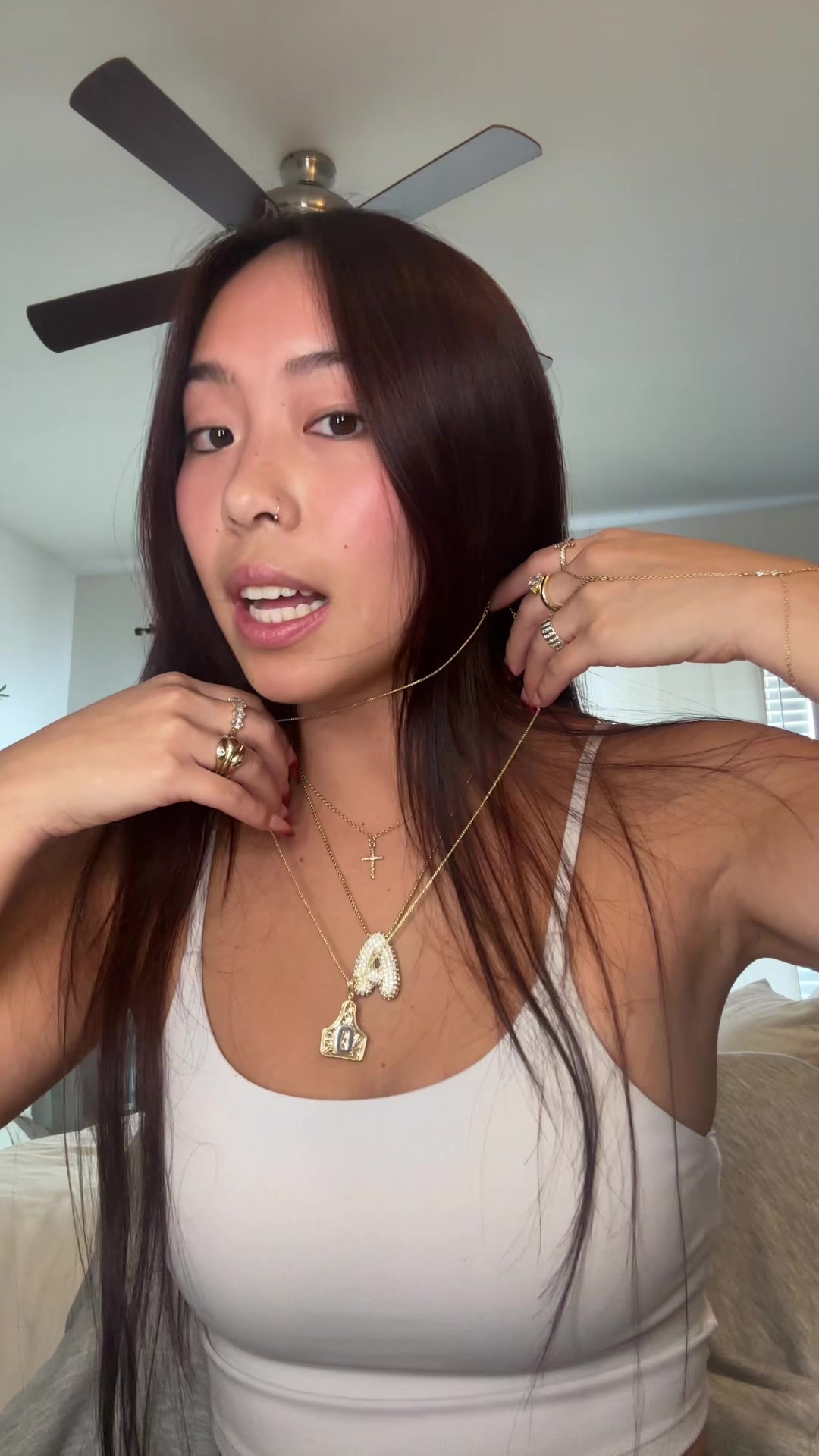 TikTok post by @oliviaangvick0 for KissYan Jewelry. Caption reads: another new necklace ! @KissYanOfficial #fyp .