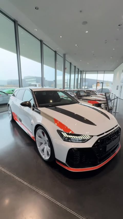 Instagram post by @carbuzz for Audi USA. Caption reads: The @audiusa #rs6 GT is the CRAZIEST station wagon....