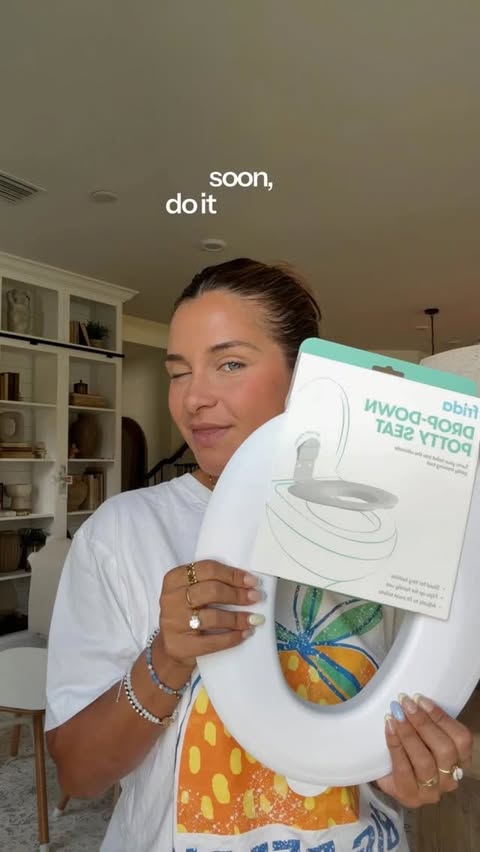 Instagram post by @fabiolamillican for Frida Baby. Caption reads: [...] 🤍comment ‘POTTY’ for the link!!!! x....