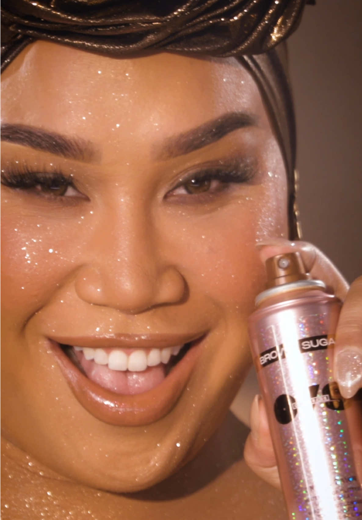 TikTok post by @patrickstarrr for ONE SIZE BEAUTY. Caption reads: Brown Sugar On ‘Til Dawn Glitter Setting Spray is....