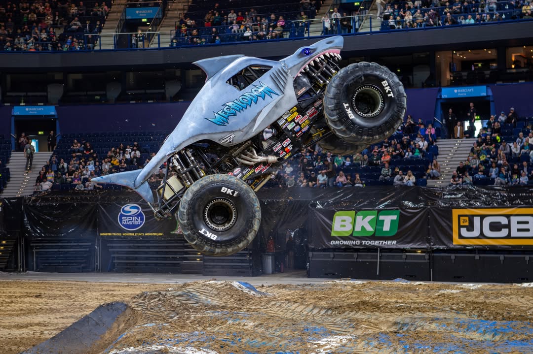 Instagram post by @consistently_curious for Monster Jam. Caption reads: [...] Closed winner @katiecaudill8 🎉 Monster Jam....