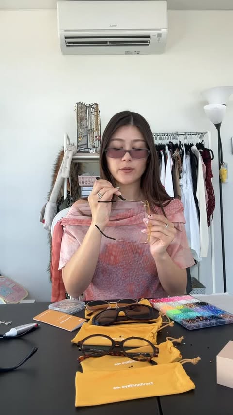 Instagram post by @kirstentitus for Eyebuydirect. Caption reads: [...] have to make three more outfits 😃....