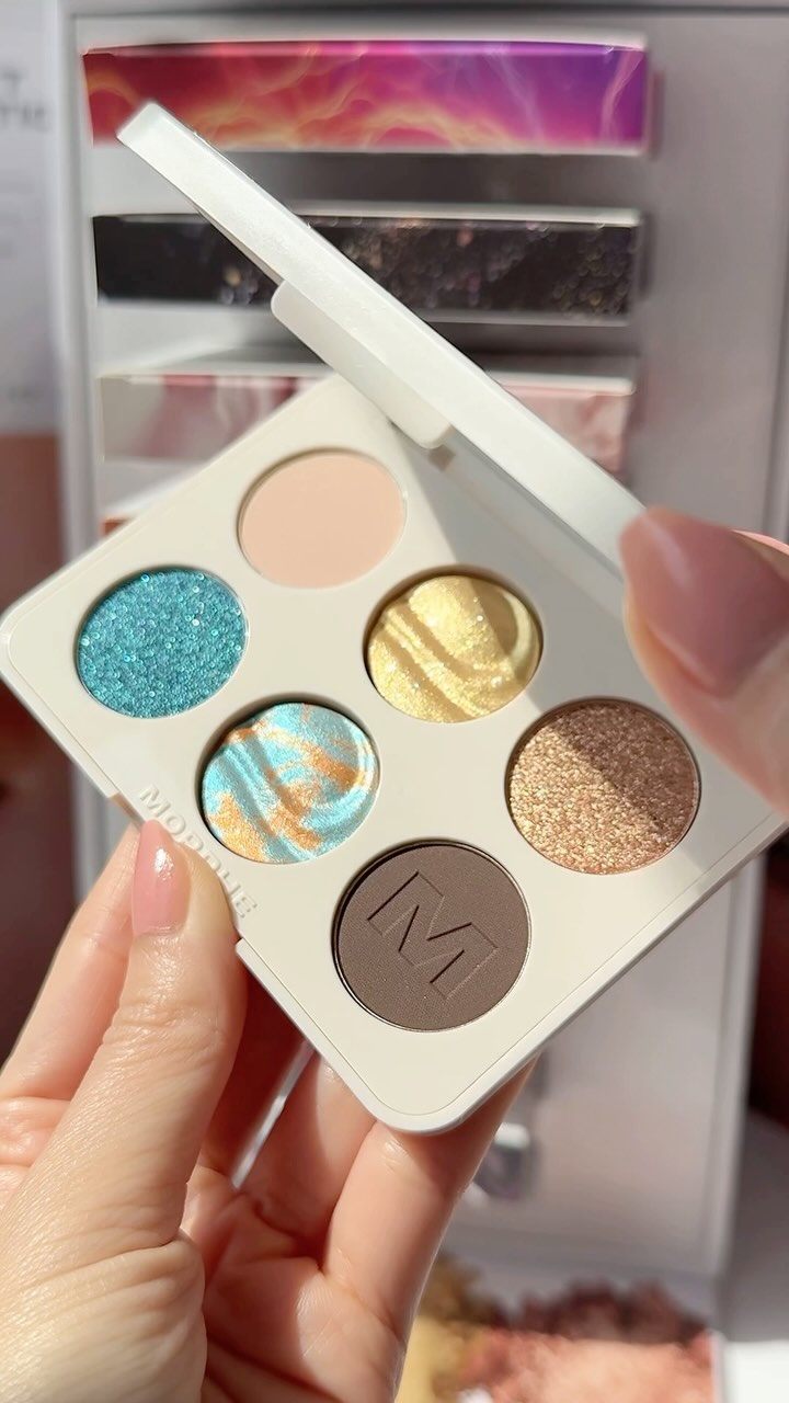 Instagram post by @fromsandyxo for Morphe. Caption reads: Oh boy…these shades are so pretty 🤩....