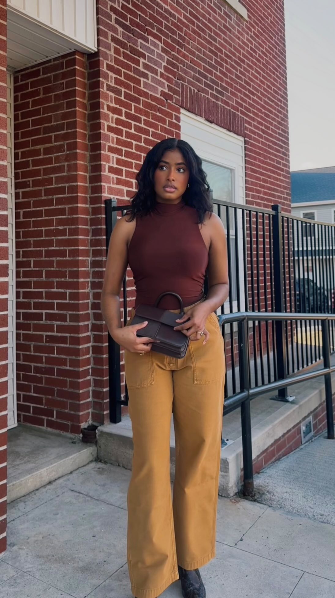 Instagram post by @ambar.penelope for Lee Jeans. Caption reads: 🤎
the utility pant you’ll actually want to live....