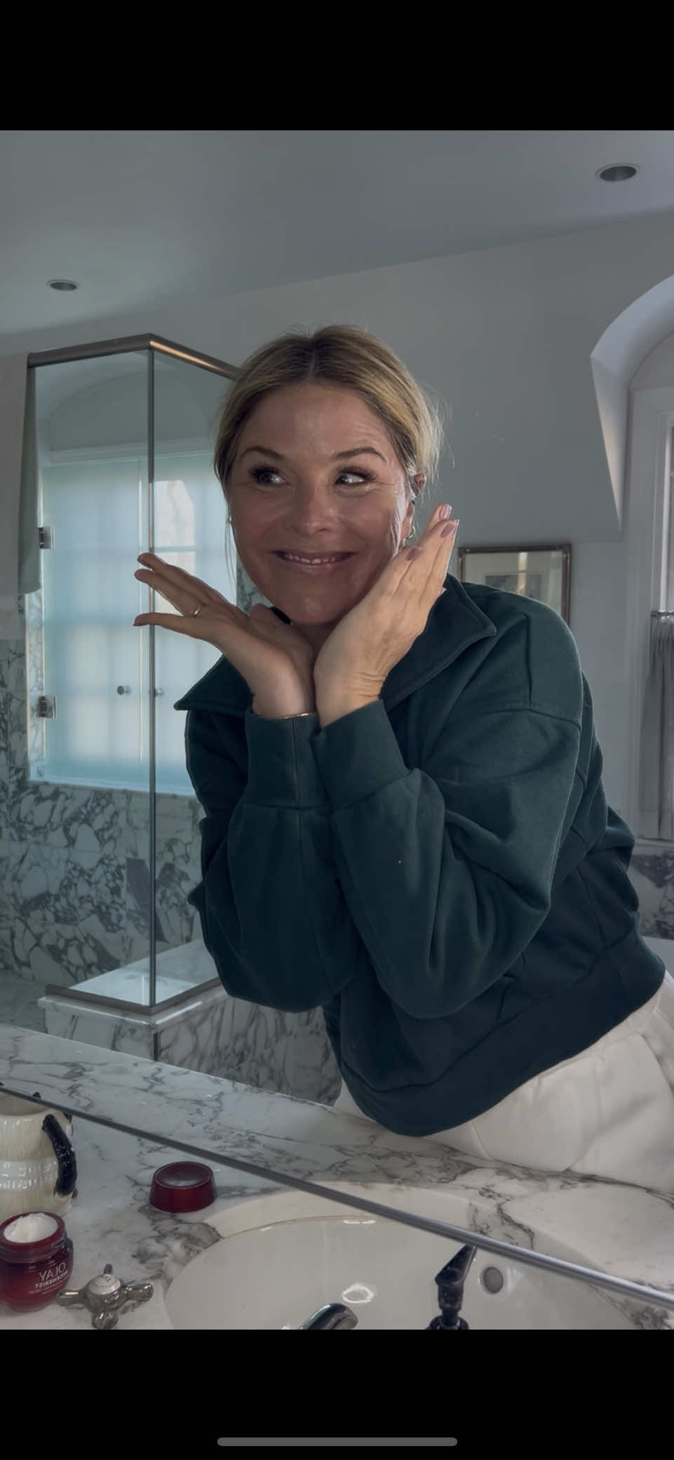 TikTok post by @jenna_bushhager for OLAY. Caption reads: #ad #olaypartner  Slow mornings at home call for a....