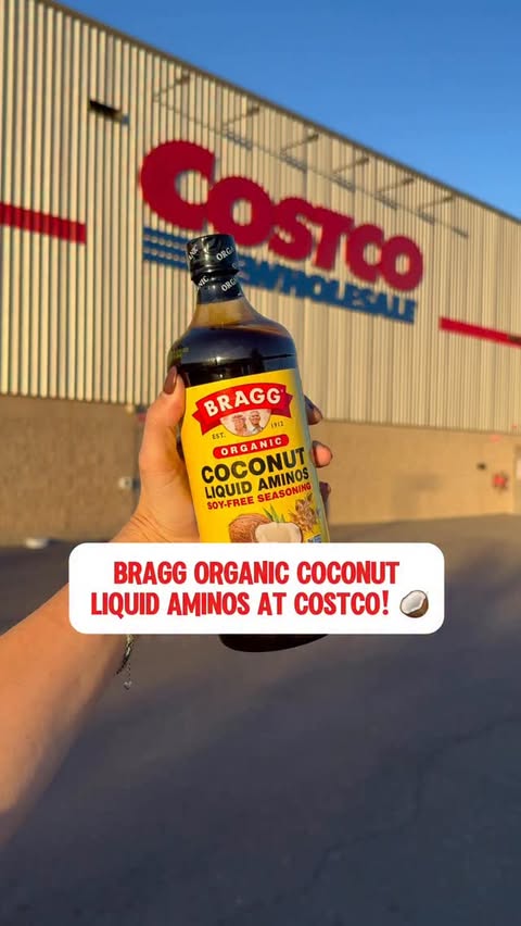 Instagram post by @costcoguide for Bragg. Caption reads: 🎉 Big news! @Bragg 30oz Coconut Liquid Aminos are....
