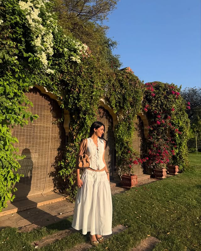 Instagram post by @gauravikumari for Jimmy Choo. Caption reads: feels like spring🌻 @jimmychoo #jimmychoo #ad.