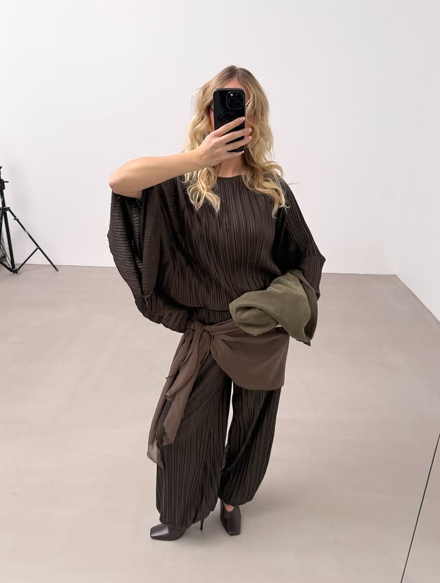 Instagram post by @katarinakrebs for NA-KD. Caption reads: [...] coming! Live on 12th of Feb at 8AM CET.....