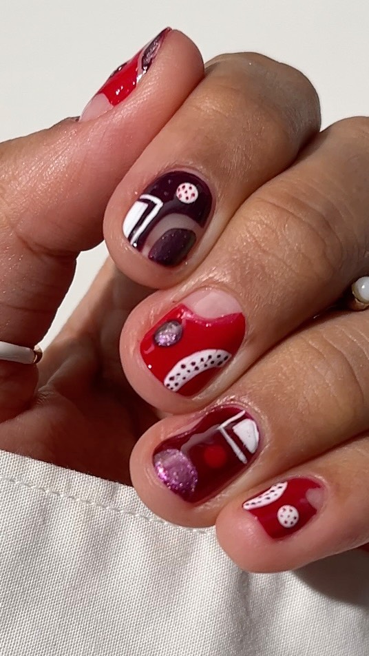 Instagram post by @nonnailartist for essie. Caption reads: ad • Brought together my favorite vampy @essie....