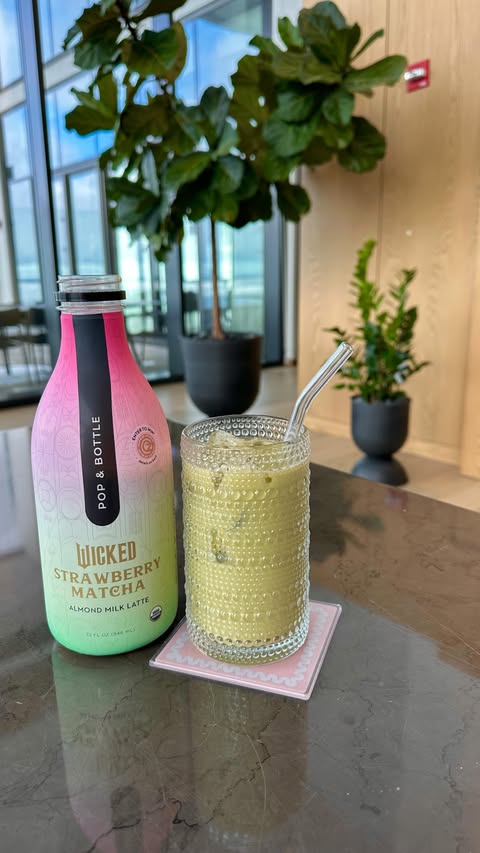 Instagram post by @spill.the.chi for Pop & Bottle. Caption reads: Pop & Bottle x Wicked 💚🩷 @popandbottle wicked....