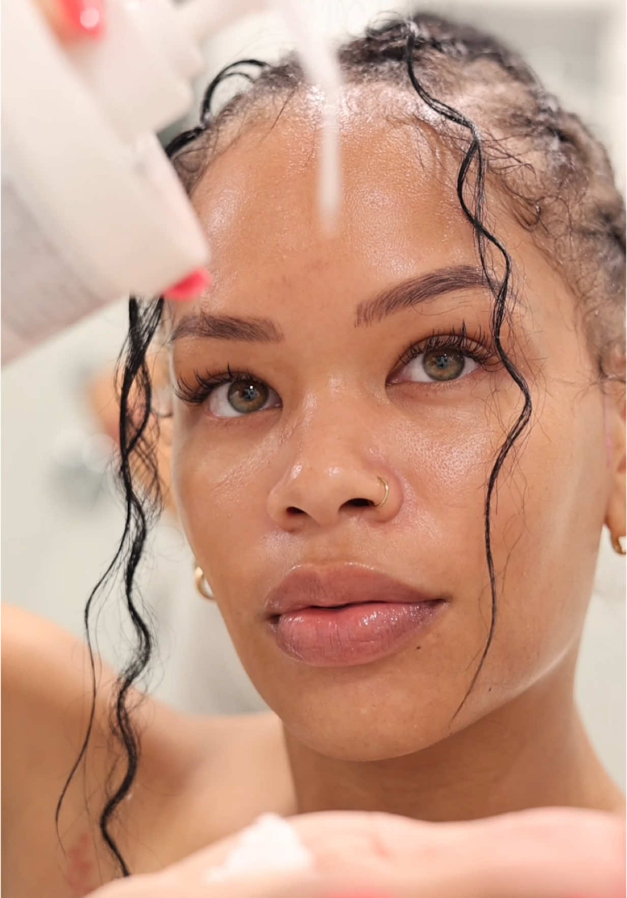 TikTok post by @arnellarmon for Donna Karan. Caption reads: [...] Co  shower oil @LOCCITANE  deodorant @Donna....