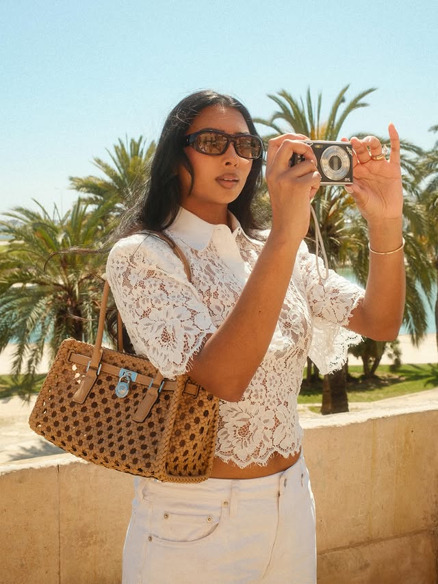 Instagram post by @noorieana for Michael Kors. Caption reads: Ad. Summer ready with @michaelkors 🌞.