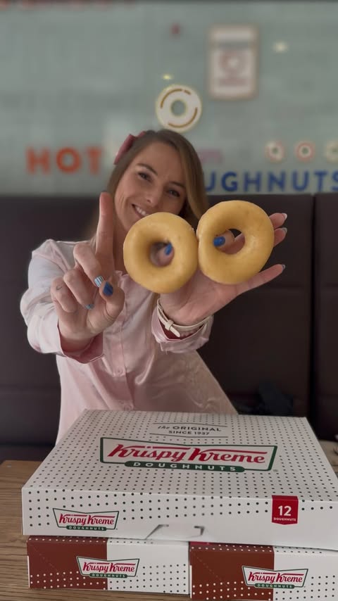 Instagram post by @lauren_magee_12 for Krispy Kreme Doughnuts. Caption reads: 🍩 🤎😬 National Doughnut Day = officially the....