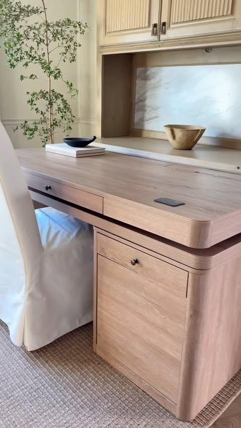 Instagram post by @woodandhomeaccents for Hulalahome. Caption reads: Veritas 360-Degree Rotating Desk Electric....