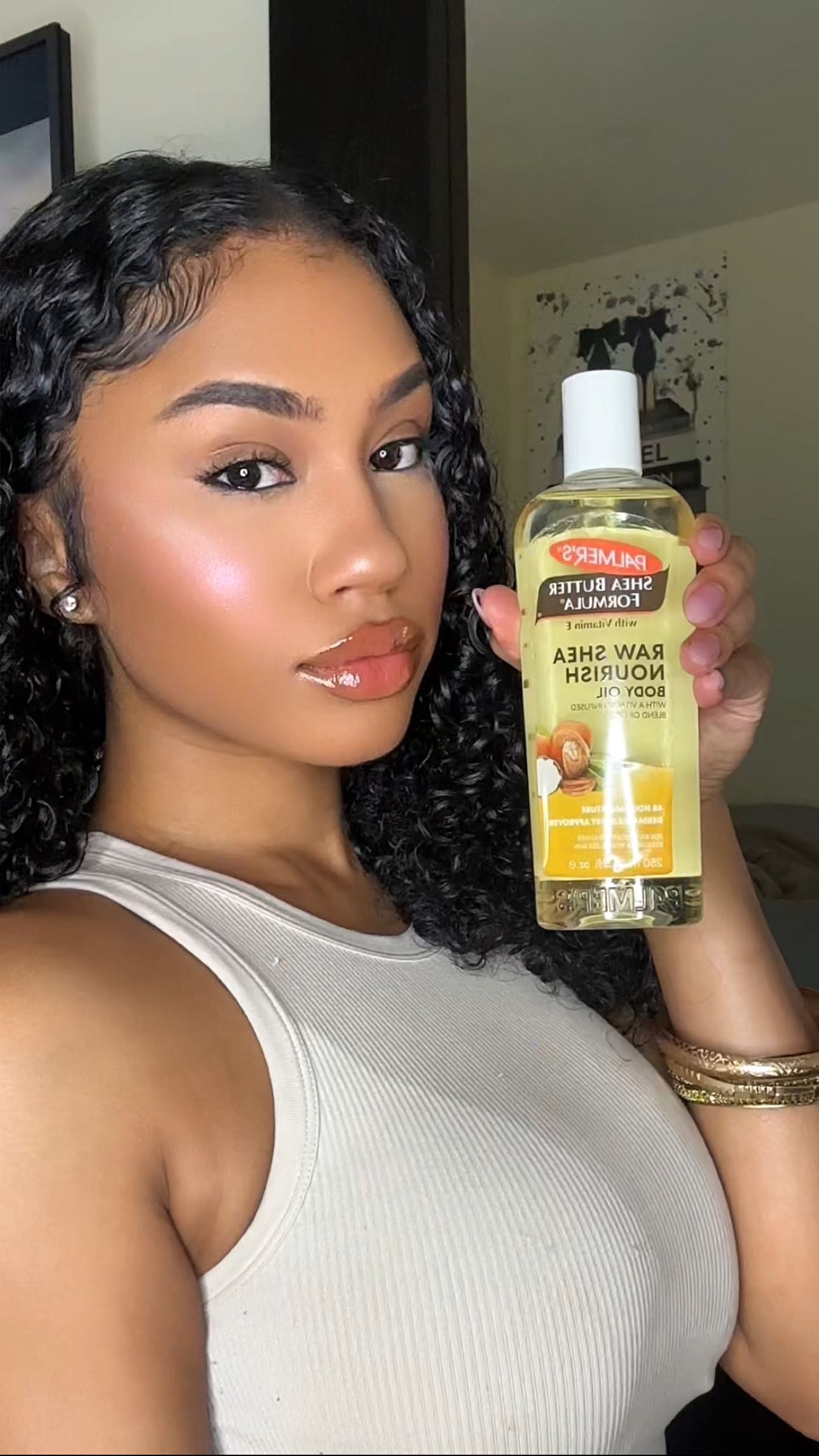 Instagram post by @blasianbabylola for PALMERS. Caption reads: my go to palmers “combination” *drake voice 😍....