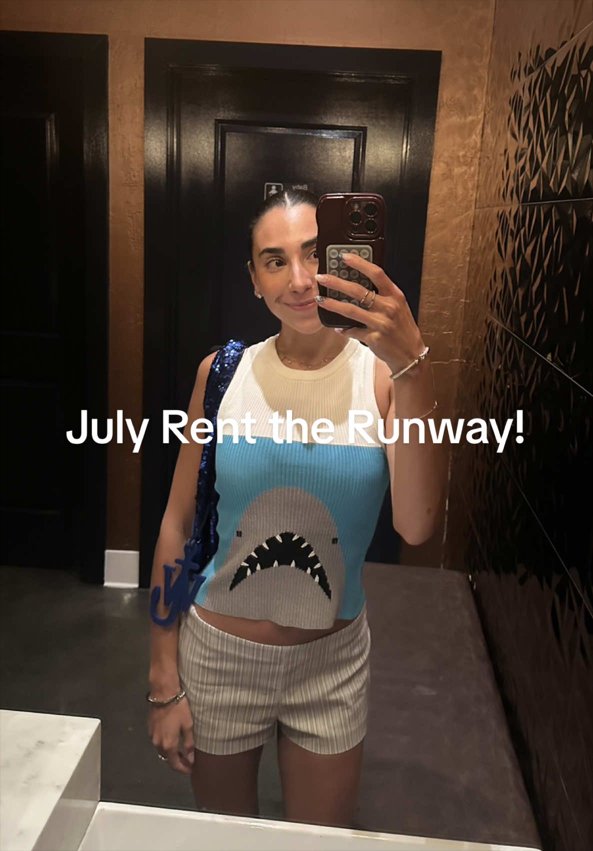 TikTok post by @irperryy for STAUD. Caption reads: [...] on this fun, summery tank from @STAUD @RTR....