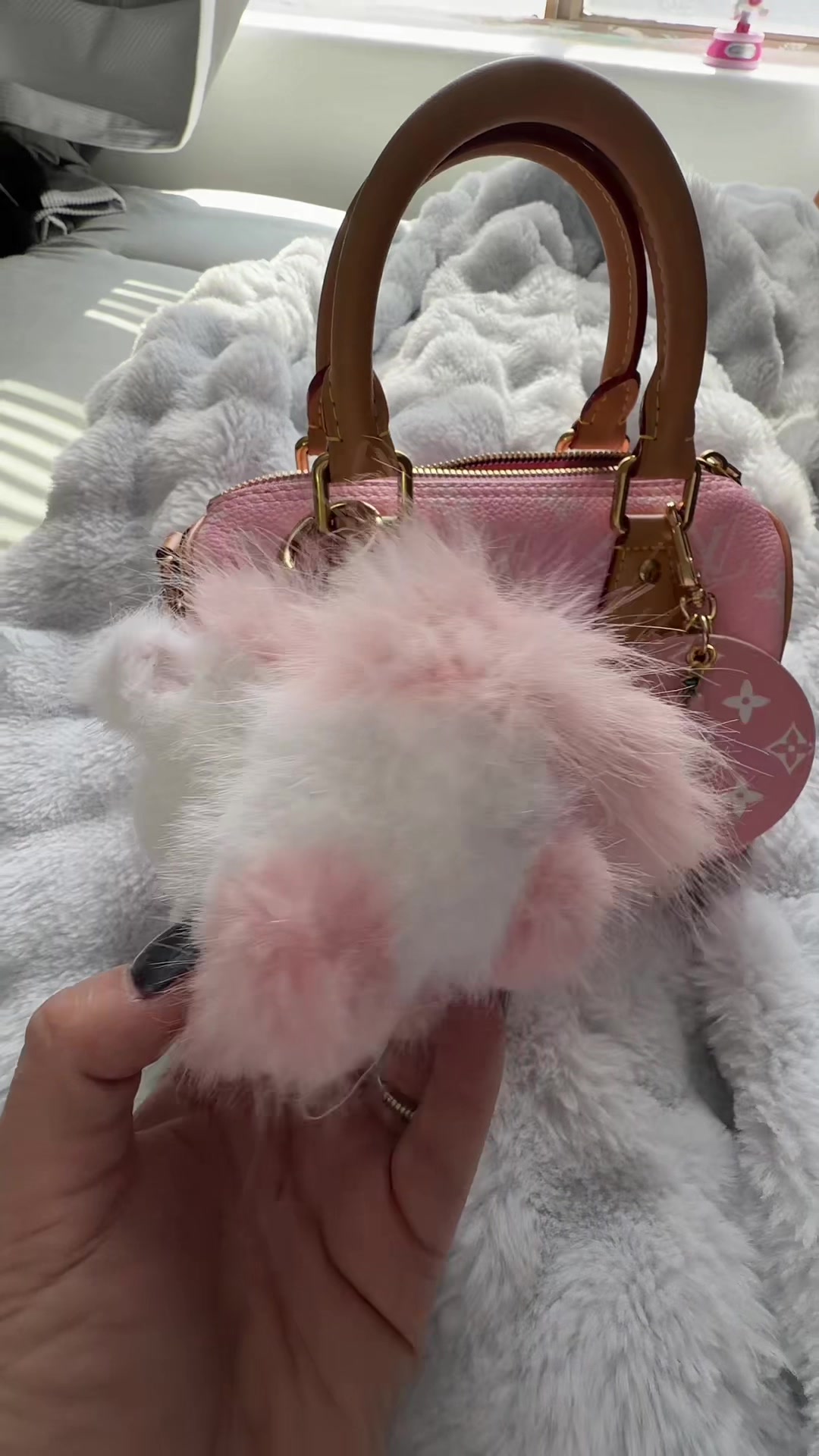 TikTok post by @shopwithmelissac for Bunnylulu. Caption reads: [...] #pursecharms #charms #keychain @BunnyLulu....
