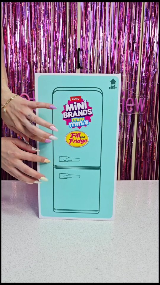 Instagram post by @tanjastoysreview for Zuru Toys. Caption reads: [AD] 🧊 #asmr Unboxing Zuru Mini Brands mini minis....