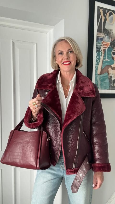 Instagram post by @stripeycoral for River Island. Caption reads: [...] Snake print boots @riverisland Burgundy bag....