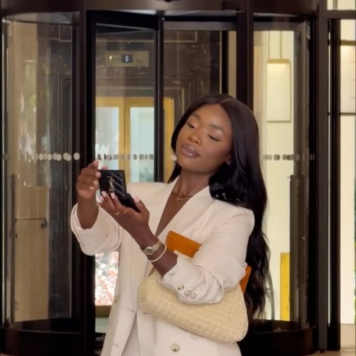 Instagram post by @nokysimbani for Lipsy London. Caption reads: 🪞✨

suit and bag: @lipsylondon 
*prtrip....