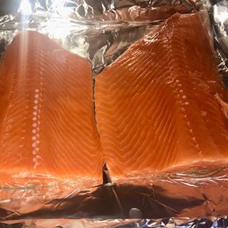 Instagram post by @1loveash for Sitka Seafood Market. Caption reads: I’ve never had salmon delivered to me til now.....