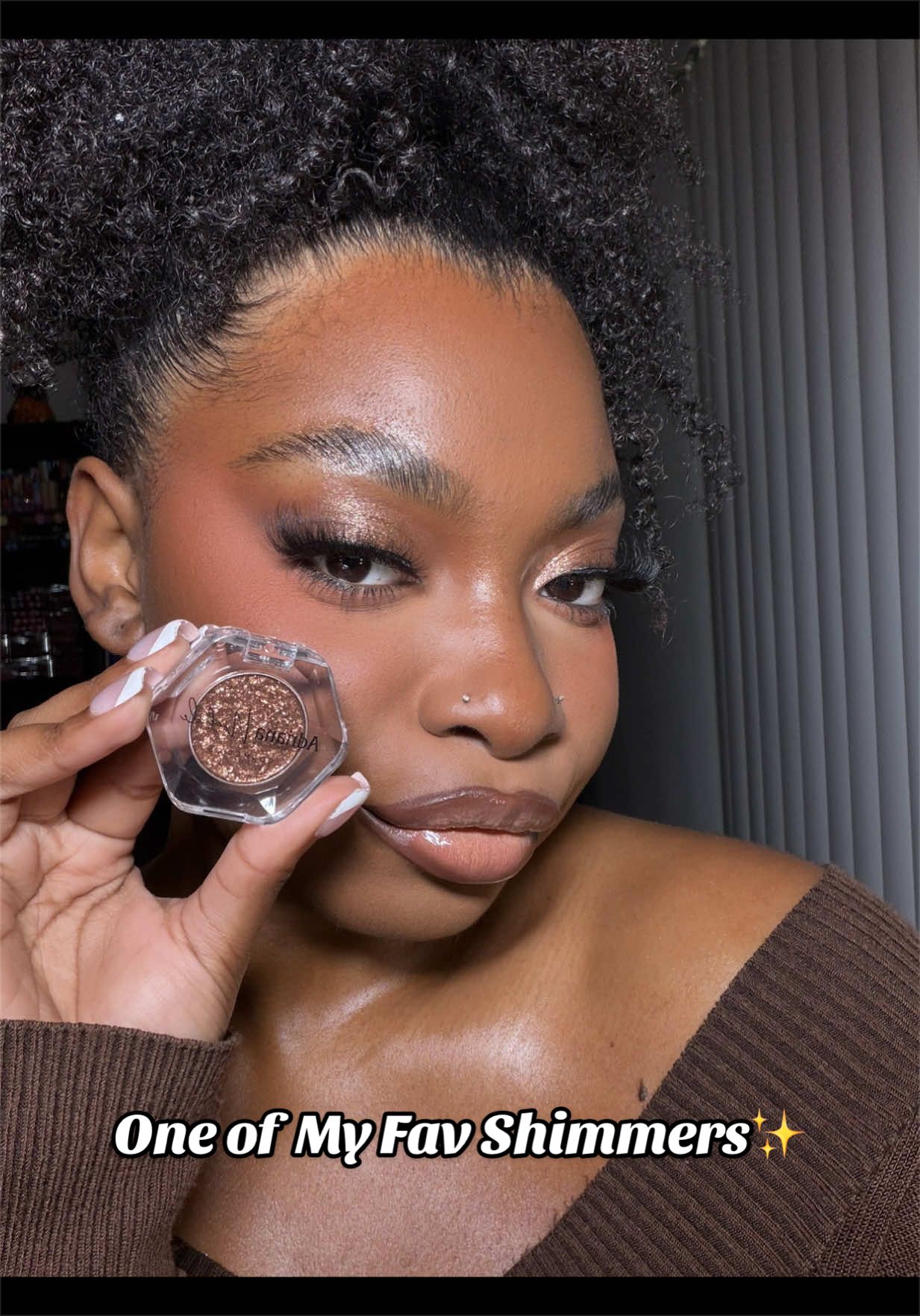 TikTok post by @ashleecookk for Adriana Nichole Cosmetics. Caption reads: My most complimented shimmer @Adriana Nichole....